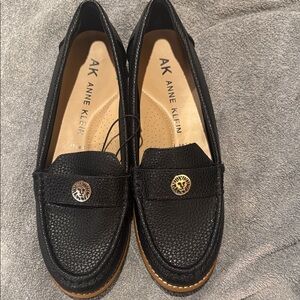 Anne Klein Black Textured Loafers with Gold Accent
